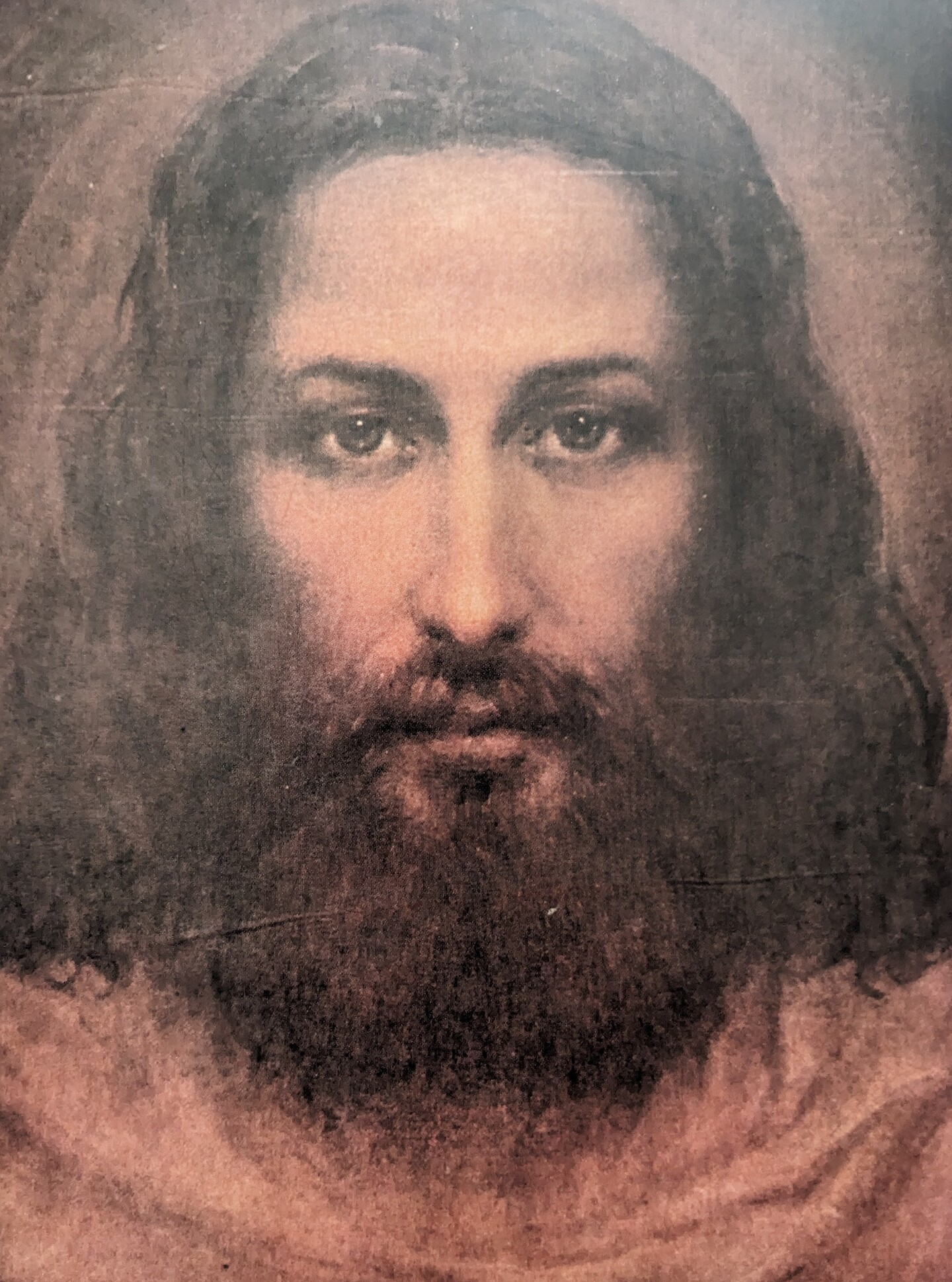 A portrait of the Lord looking intently of the viewer. This is the back cover of the original text.